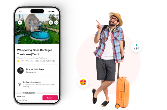 Vacation rental app on a phone next to a traveler with luggage